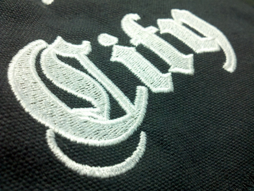 Fill stitched lettering with a short satin border is a lot tougher than an equivalent satin-stitched version.