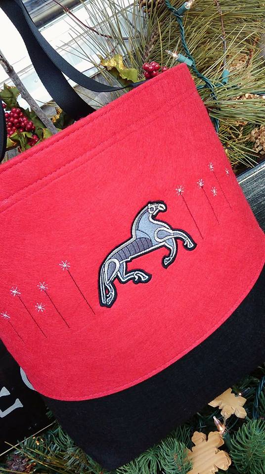 Viking-Age inspired horse design: machine embroidery digitizing by Erich Campbell on a bag decorated by Carolyn Cagle