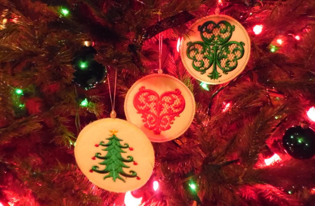Embroidered ornaments by Strikke Knits from Designs by Erich Campbell on the Tree