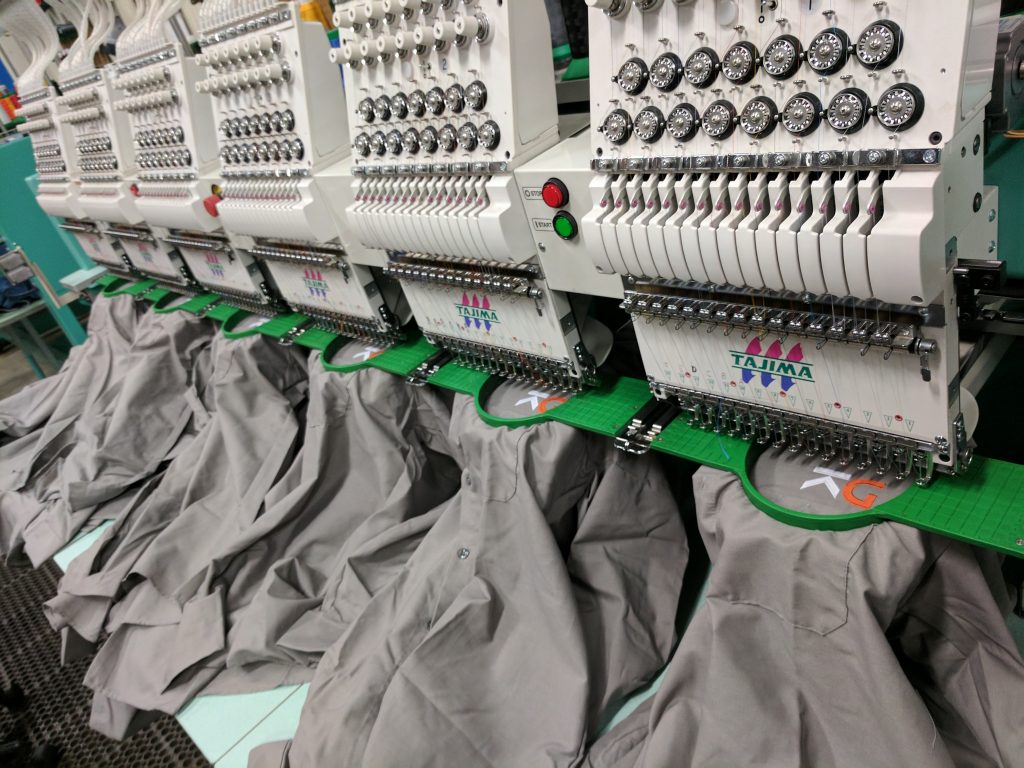 A run of uniform shirts on a multihead embroidery machine