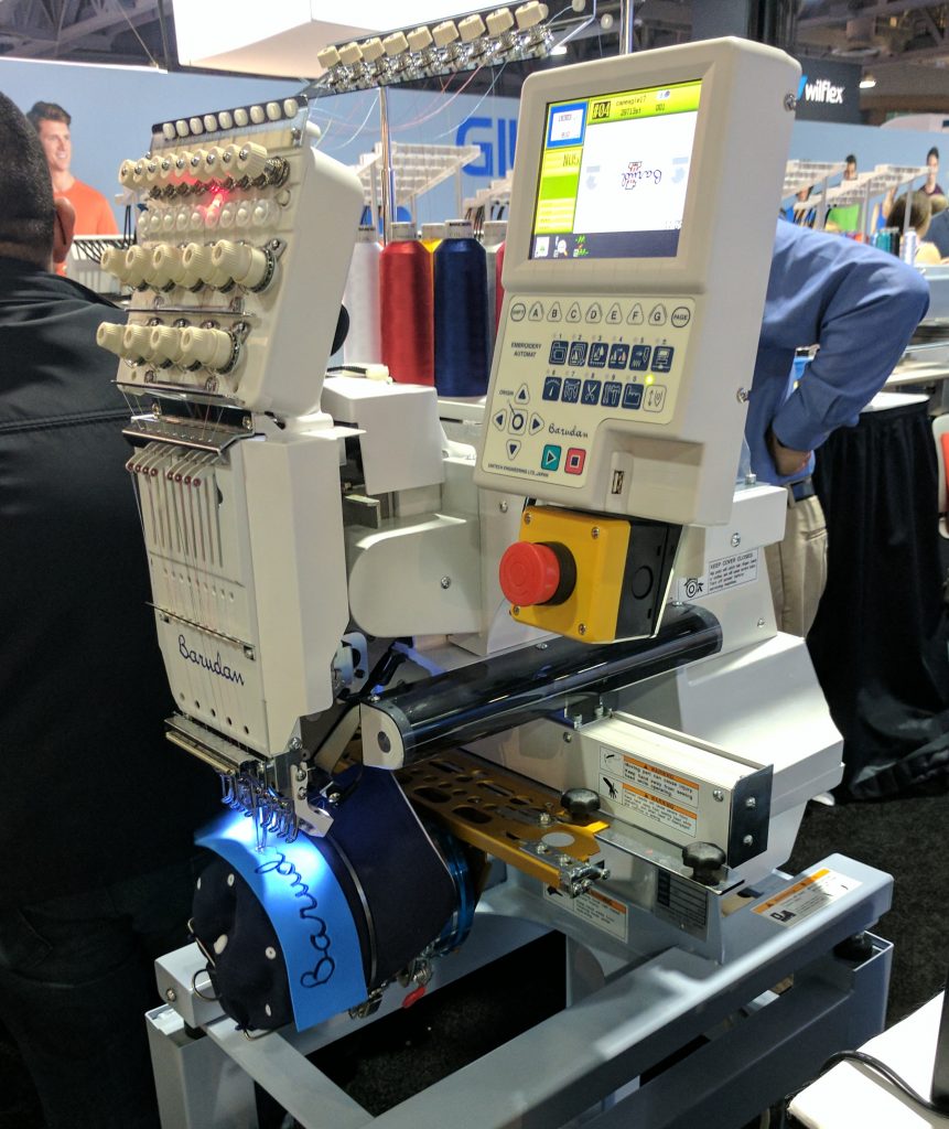 Barudan Embroidery Machine running Puffy 3D Foam on Baseball Cap at a Decorated Apparel Tradeshow